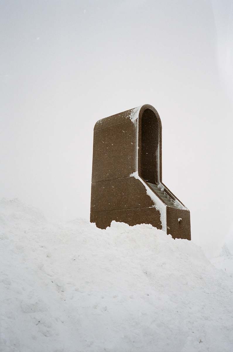 timberline lodge photo of brown case on snow ground bunker